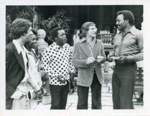 Comedians David Steinberg and Flip Wilson with Playboy founder Hugh Hefner and NFL great Jim Brown at a NORML fundraiser at th ePlayboy Mansion